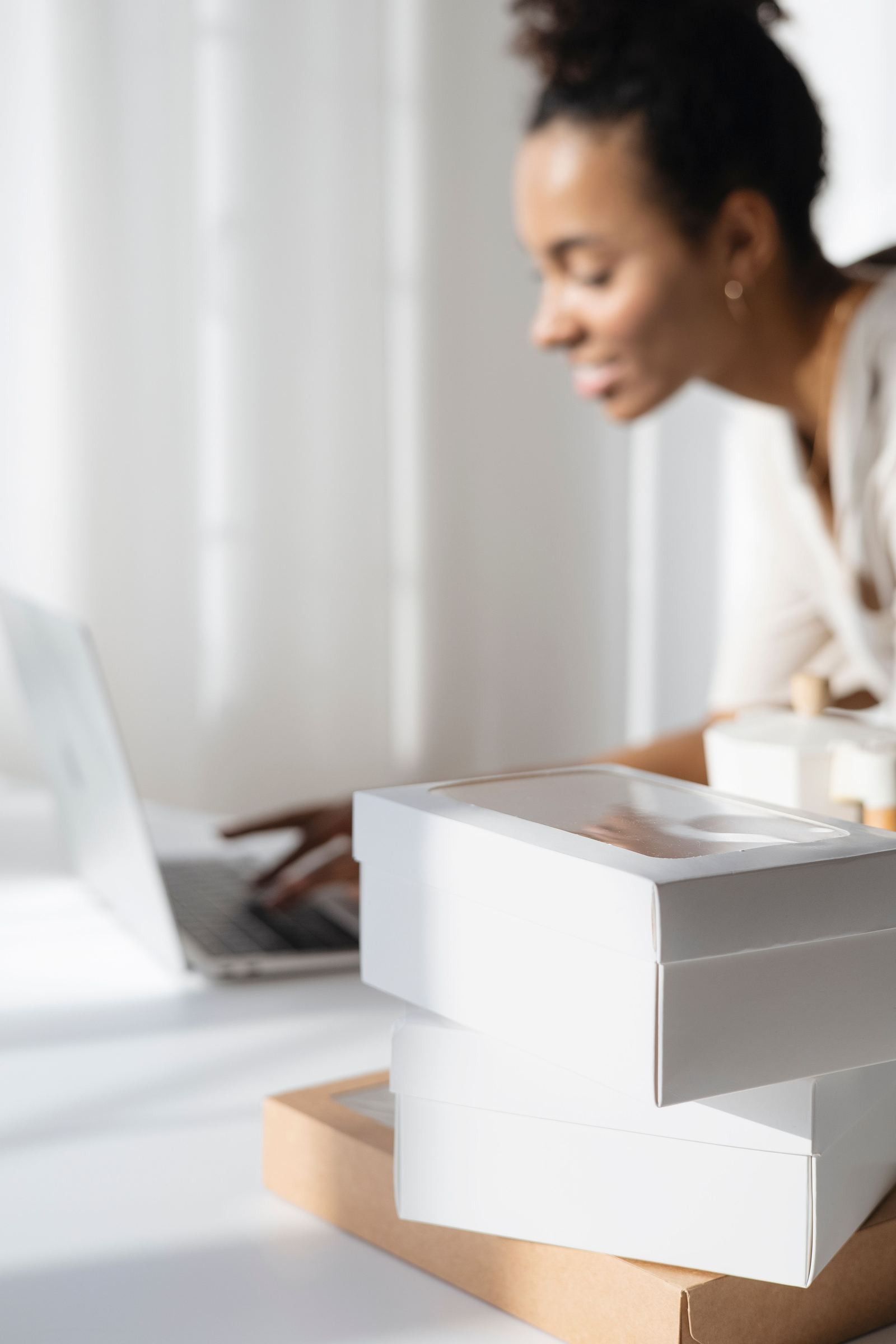 Reseller packing an order at home